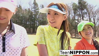 Young Asian Ladies Compete In A Game Of Strip Golf