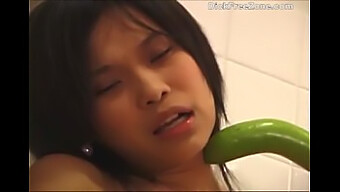 Petite Thai Teen Emma Achieves Orgasm Through Cucumber Play