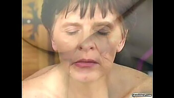 A Mature Woman Enjoys A Young Man'S Genitals And Receives A Facial